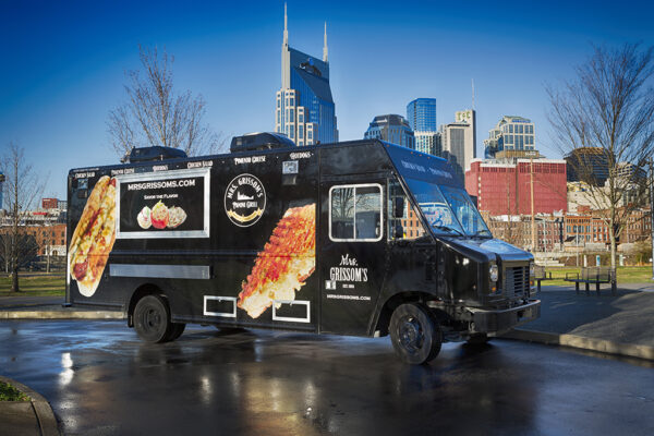 Mrs. Grissoms Food Truck with Nashville cityscape background.